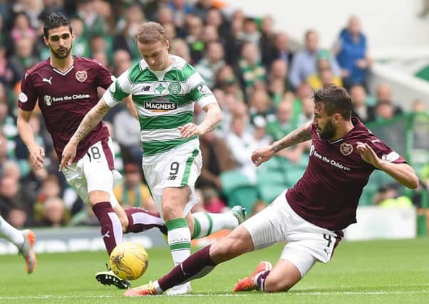 Augustyn, right, says Hearts have the belief they can challenge Celtic for the title. Picture: David Lamb