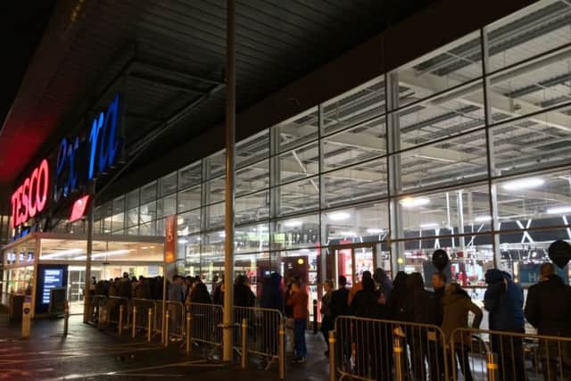 People shop for discount items at the Tesco Extra in Siverburn, Glasgow on Black Friday. Picture: Hemedia