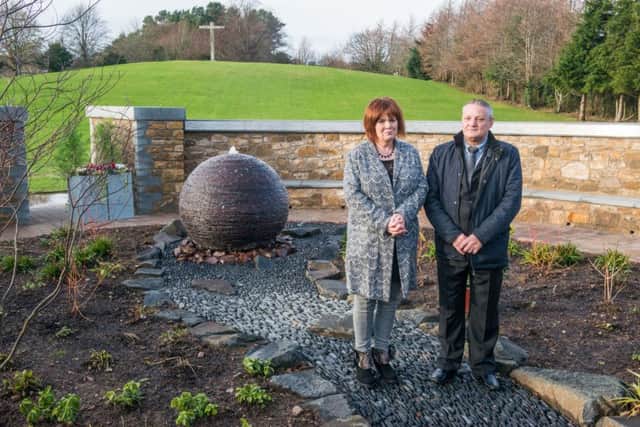 Dorothy Maitland and Willie Reid Looks at a memorial for her daughter. Picture: TSPL