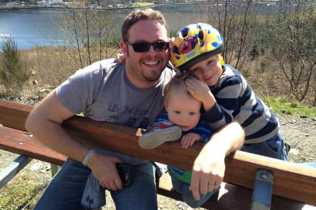 Luke Dalrymple, pictured with sons Innis and Orran, says there is no evidence the service needs to be moved to a single site. Picture: comp