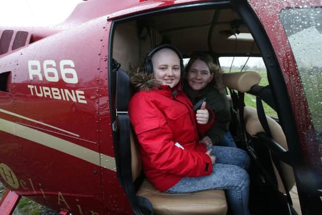 Shona with her daughter Megan Fletcher after they arrive in Edinburgh by helicopter for her chemotherapy. Picture: PA