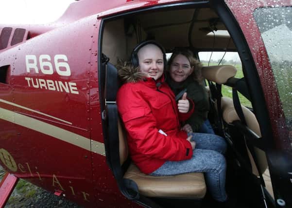 Shona with her daughter Megan Fletcher after they arrive in Edinburgh by helicopter for her chemotherapy. Picture: PA