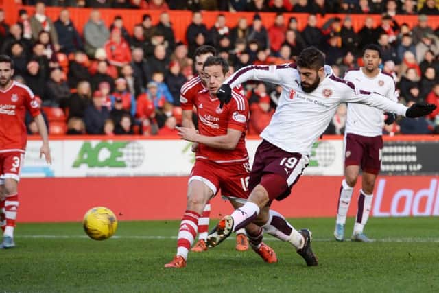 Hearts' Juanma Delgado misses from close range. Picture: SNS
