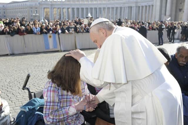 Corinne Barber receives her personal blessing from Pope Francis. Picture: L'Osservatore Romano