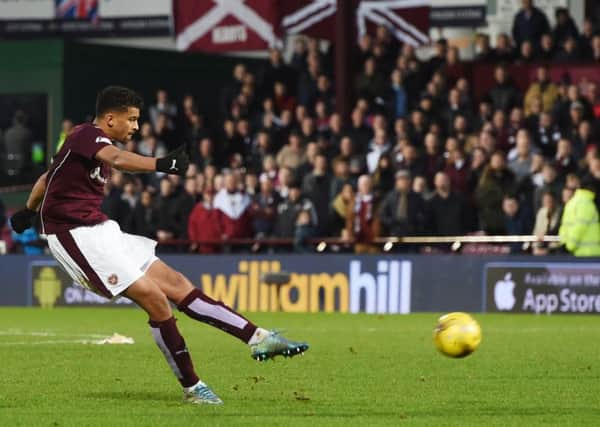 Osman Sow strikes the ball from distance as his late goal earns a point for Hearts. Picture: SNS Group