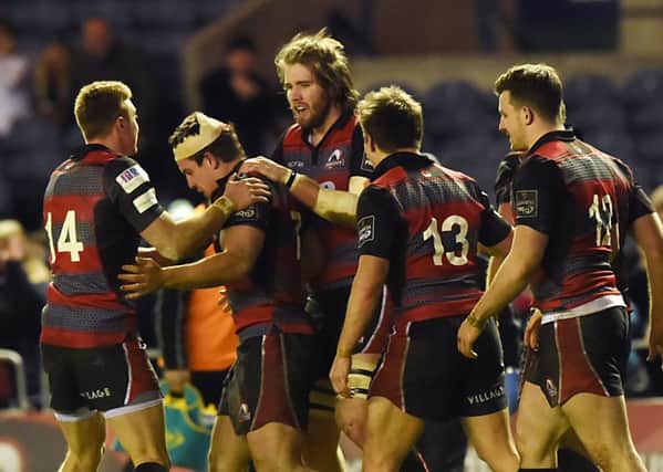 John Hardie (second from left) celebrates having scored a try at the death. Picture: SNS