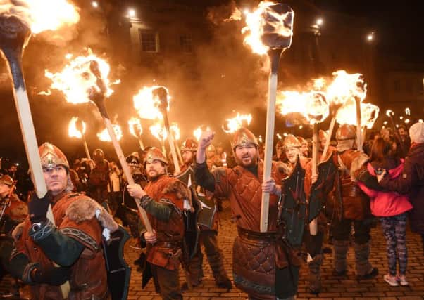 Vikings lead the Torchlight Procession. Pictures: Greg Macvean