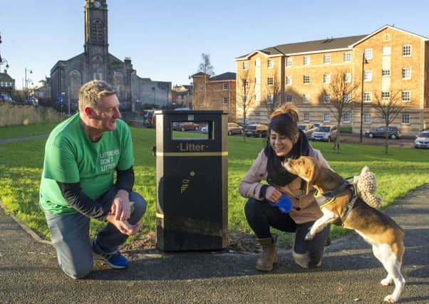 Gerry Farrell with Karolina Dobrzynska and her dog, Tila, in Cables Wynd Park, Leith. 
Picture: Ian Rutherford
