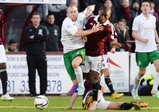 Hibs' Dylan McGeouch and Hearts' Morgaro Gomis will renew hostilities. Pic: SNS