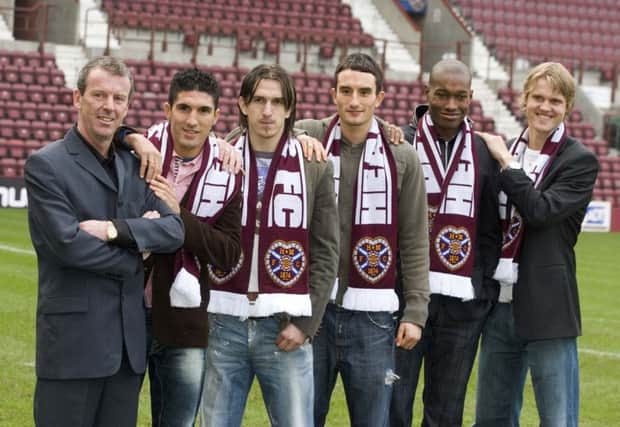 Then Hearts boss Graham Rix with five of the 11. From left to right: Bruno Aguiar, Mirsad Beslija, Chris Hackett, Jose Goncalves and Juho Makela. Picture: SNS