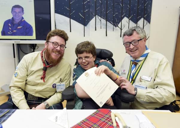 Robbie Dalgleish with Chief Commissioner for Scouting Scotland, Graham Haddock, right. Picture: Sandy Young