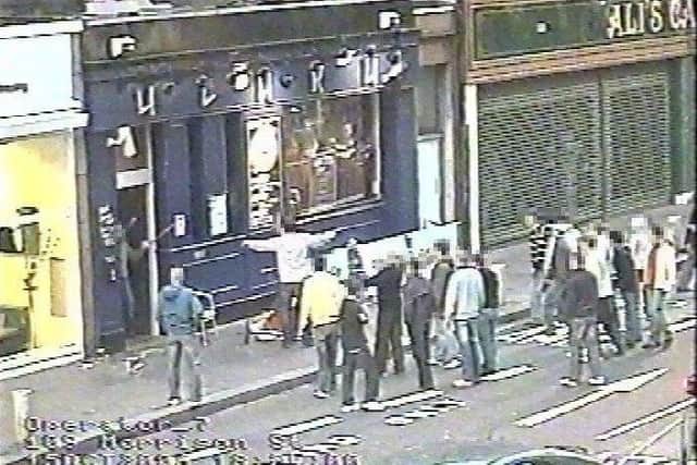 A CCTV image of disorder on Lothian Road after a Hibs-Hearts game in 2006. New cameras will offer a sharper image. File picture: Lothian and Borders Police/PA