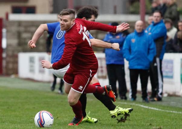 Kevin Kelbie goes on the attack for Linlithgow Rose. Pic: Scott Louden