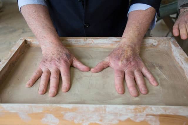 Sir Tom Farmer getting his hand print moulded for Edinburgh Award 2016 at Nic Boyce's studio. Picture: CEC