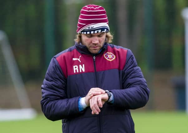 Robbie Neilson is still looking to bolster his Hearts squad. Pic: SNS