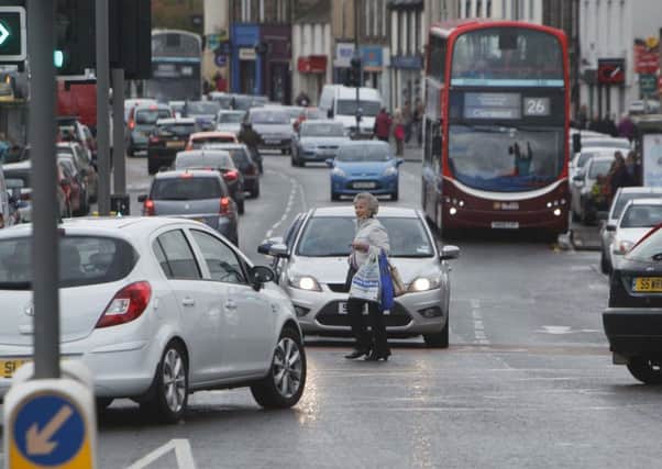 Stop-start traffic heads along Musselburgh High Street. Picture: Toby Williams