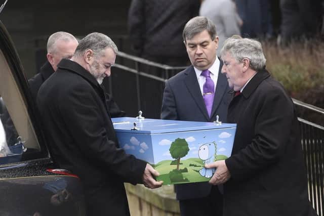 Kai Laidlaw's coffin is carried into the crematorium. Picture: Greg Macvean