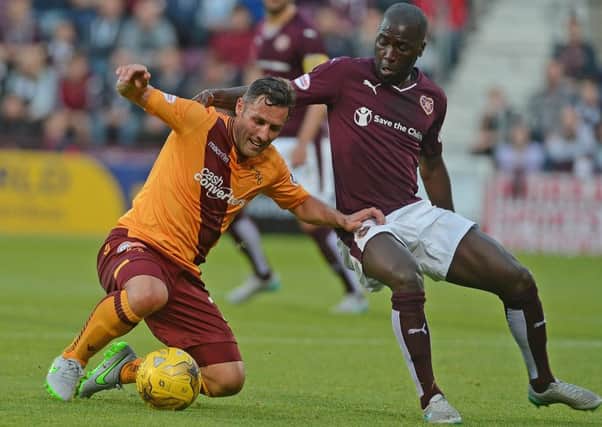 Morgaro Gomis, right, has joined Motherwell. Pic: Neil Hanna