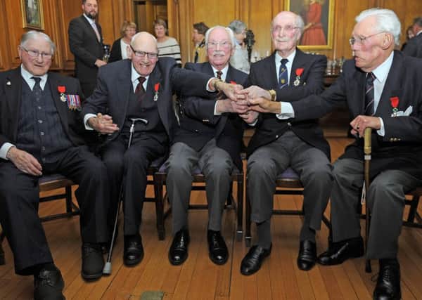 From left, Alexander Addison, Thomas Gilzean, David Watt, Jim Alexander Stirling and Alexander Mees accept their 

Legion d'Honneur medals. Picture:
 Neil Hanna