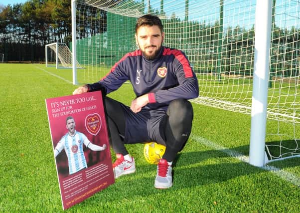 Hearts captain Alim Ozturk has urged more supporters to join the Foundation of Hearts. Pic: Eric McCowat