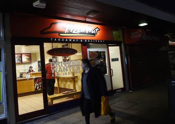 Pizza Hut in St John's Road, Corstorphine, has been named and shamed for not paying minimum wage. Picture: Greg Macvean