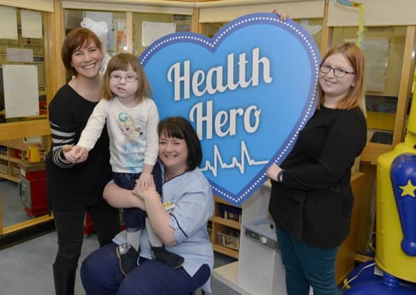 Last year's Health Hero Margaret McEwan joins Jane Rennie and daughter Bella along with Forth 1 presenter Arlene Stuart. Picture: Julie Bull