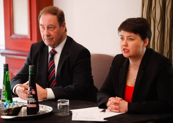 Ruth Davidson and Sir Iain McMillan announce the results of an independent tax commission. Picture: Scott Louden
