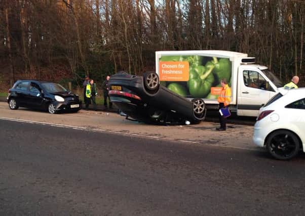 The upturned Honda Civic on Maybury Road. Picture: Contributed