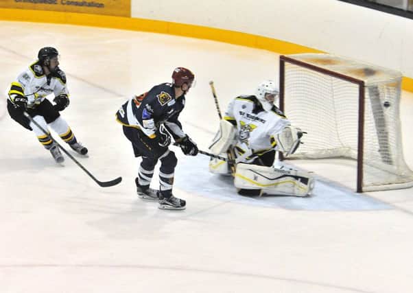 Capitals Taylor Dickin scores his second goal against Manchester Storm last Sunday. Picture: Jan Orkisz/SMP