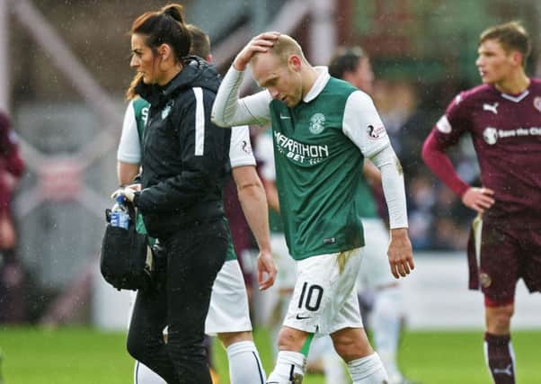 Dylan McGeouch was forced off by a muscle problem at Tynecastle