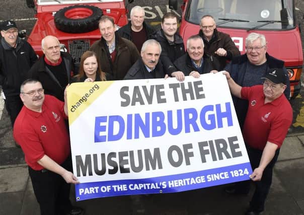Protesters demonstrate outside the fire museum at Tollcross. Picture: Greg Macvean