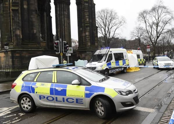 Police at the Scott Monument yesterday. Picture: Greg Macvean