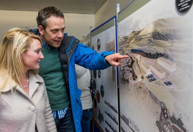 David and Nomi Neilson view the plans at an exhibition staged at Asda's Straiton branch. Picture: Ian Georgeson