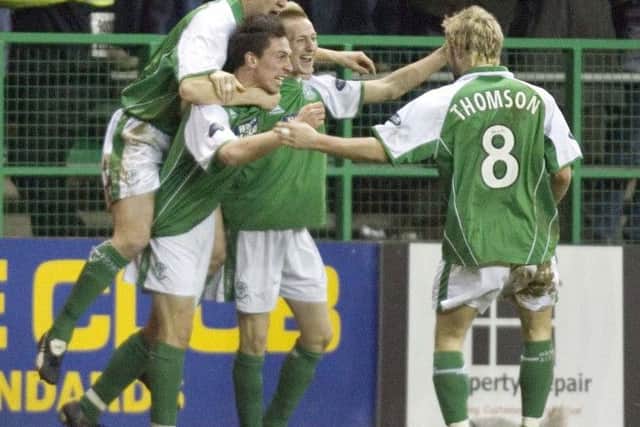 Thomson played with fellow young Scotland internationalists Gary Caldwell, Scott Brown and Derek Riordan. Pic: SNS