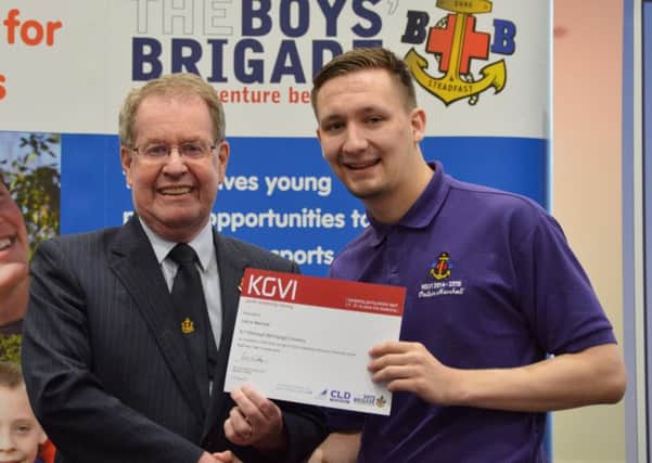 Callum Marshall was presented with his certificate by the Very Reverend Andrew McLellan. Picture: supplied