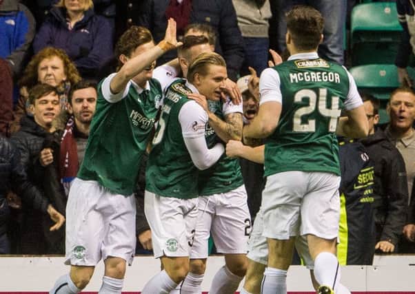 Hibs celebrate Jason Cummings' goal after four minutes. Pic: Ian Georgeson