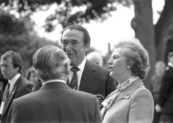 Margaret Thatcher speaks to Robert Maxwell during a visit to the Games village. Picture: Hamish Campbell
