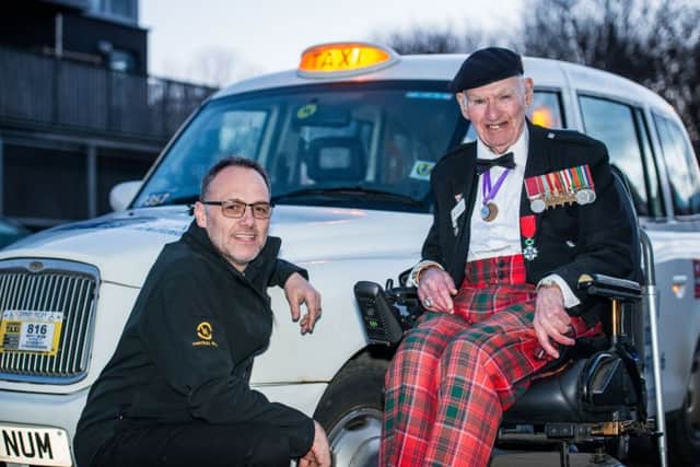 Central Taxis driver John Hood and Tom Gilzean. Picture: Ian Georgeson
