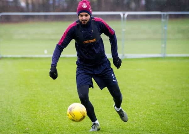 Alim Ozturk is available for selection as Hearts face Dundee United