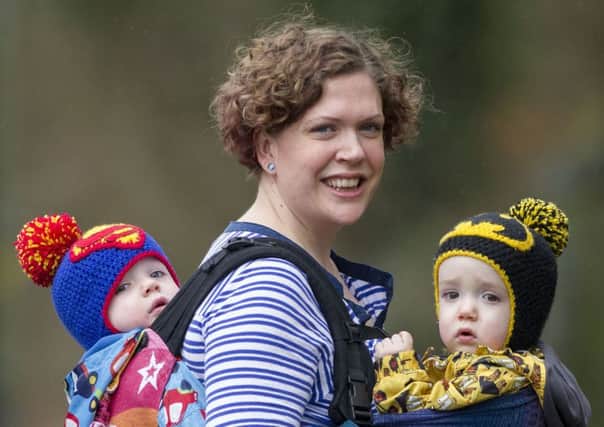 Victoria Schofield and her twin sons Thomas, left, and Jacob are to take part in a 5K run. Picture: Ian Rutherford