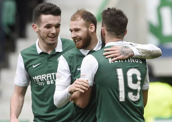 Martin Boyle, centre, takes the plaudits after scoring his second and Hibs third goal in the 3-0 victory over Alloa Athletic. Picture: Greg Macvean