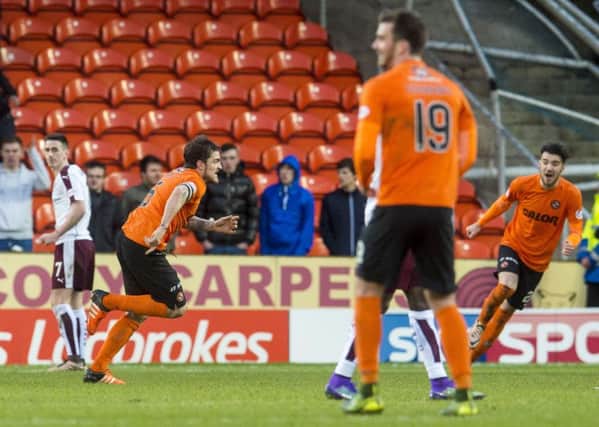Paul Paton celebrates his late winner for Dundee United