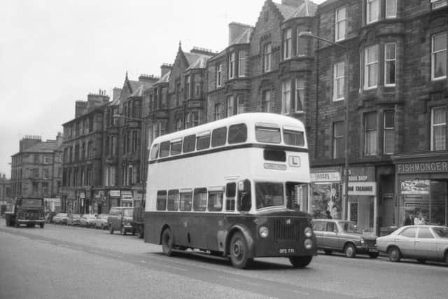 1974 - One of the first Titan's to be repainted in the trainer driver livery heads up Leith Walk.