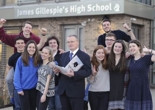 Headteacher  Donald J Macdonald is joined by sixth year pupils to celebrate James Gillespie's being named Scottish State School of the Year 2015. Picture:   Neil Hanna