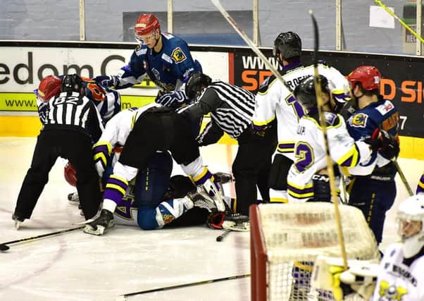 This was just one of the full-blooded confrontations which broke out in the Manchester Storm game last Sunday. Picture: Jan Orkisz/SMP