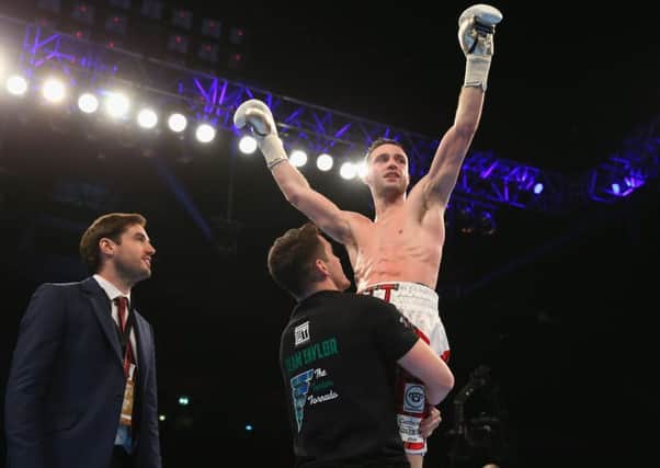 Josh Taylor celebrates after victory over Lyes Chaibi. Picture:  Alex Livesey/Getty Images