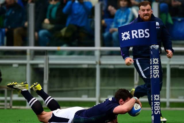 John Hardie dives over the line to score Scotlands second try at Stadio Olympico in Rome
