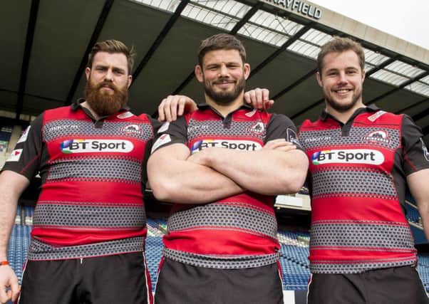 Simon Berghan, left, Ross Ford, and Allan Dell, right, have all signed new deals with Edinburgh. Ford was quick to hail the influence of forwards coach Steve Scott, below, on the Capital outfits pack
