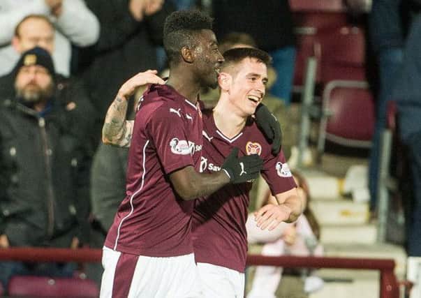 Jamie Walker celebrates his opener with Prince Buaben. Pic: Ian Georgeson