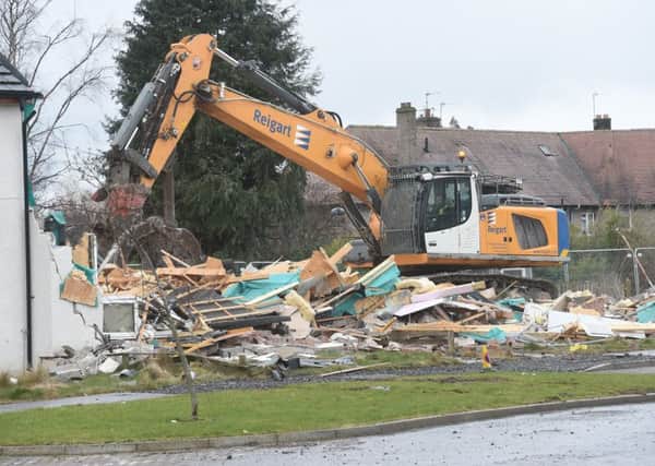 Demolition work is under way at homes in Newbyres Crescent in Gorebridge. Picture: Greg Macvean